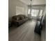 Inviting living room with comfortable seating, bay windows, and neutral decor at 12235 E 2Nd Dr, Aurora, CO 80011