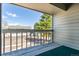 Private balcony with neighborhood views and wooden decking for outdoor enjoyment at 3049 E Long S Cir, Centennial, CO 80122