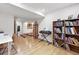 Finished basement with hardwood flooring, creating a versatile space for entertainment and relaxation at 823 Timothy Dr, Longmont, CO 80503