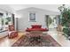 Cozy living room featuring hardwood floors, neutral walls, and an abundance of natural light at 823 Timothy Dr, Longmont, CO 80503