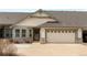 Charming single-Gathering home featuring a two-car garage, well-maintained lawn, and neutral-toned siding at 23753 E Kettle Pl, Aurora, CO 80016