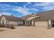 Spacious single story home featuring a large driveway and attached garages, great for multi car families at 23753 E Kettle Pl, Aurora, CO 80016