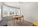 Bright office featuring a large window with shutters, a desk, and a comfortable chair at 23753 E Kettle Pl, Aurora, CO 80016