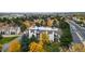 Scenic aerial view of the building surrounded by vibrant fall foliage and neighborhood at 491 S Kalispell Way # 305, Aurora, CO 80017