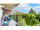 Inviting balcony with plants and a view of the outdoors, perfect for relaxation at 491 S Kalispell Way # 305, Aurora, CO 80017