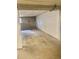 This unfinished basement has concrete floors and white-painted walls at 491 S Kalispell Way # 305, Aurora, CO 80017