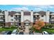 Charming condo building with well-maintained landscaping and inviting entrance at 491 S Kalispell Way # 305, Aurora, CO 80017