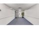 Hallway in building with doors for elevator and storage, as well as potted plant at 491 S Kalispell Way # 305, Aurora, CO 80017
