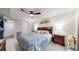 Comfortable main bedroom with ceiling fan, and ample closet space at 491 S Kalispell Way # 305, Aurora, CO 80017
