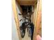 This storage unit has bikes, shelves, and various containers inside at 491 S Kalispell Way # 305, Aurora, CO 80017