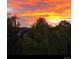 This beautiful sunset view over the mountains and neighborhood at 491 S Kalispell Way # 305, Aurora, CO 80017