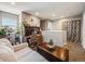 Upstairs loft with natural lighting, perfect for a home office or relaxation space at 246 Ash St, Bennett, CO 80102
