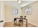 Office room showcasing natural light, wood-style floors, and a dedicated workspace at 5820 S Cherokee St, Littleton, CO 80120