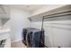 Functional laundry room equipped with modern washer and dryer, and ample shelving for storage at 1018 Mcmurdo Cir, Castle Rock, CO 80108