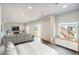 Bright living room with view to the backyard and sliding glass doors at 1018 Mcmurdo Cir, Castle Rock, CO 80108