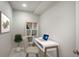 A bright office featuring a sleek desk, modern shelving, and a comfortable chair, perfect for working from home at 1018 Mcmurdo Cir, Castle Rock, CO 80108