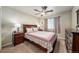 Bedroom with double bed, nightstands, and dresser at 5482 Wetlands Dr, Frederick, CO 80504