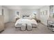 Bright main bedroom featuring neutral walls, carpet, and complementary decor at 3433 N Wabash St, Denver, CO 80238