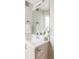 Bathroom with a single sink and modern vanity at 1836 Grove St # 107, Denver, CO 80204