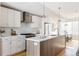 Gourmet kitchen featuring a large island and ample counter space at 1836 Grove St # 107, Denver, CO 80204