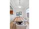 Bright dining room with seating for six, a modern chandelier, and large picture window at 45 N Ogden St # 309, Denver, CO 80218