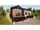 Mountain home exterior with wood siding, multiple levels, and attached garage at 528 N Fuller Placer, Breckenridge, CO 80424
