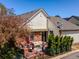 Inviting backyard patio features cozy seating and vibrant greenery, perfect for outdoor relaxation at 7722 E 6Th Pl, Denver, CO 80230