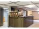 The basement features a bar and partial finish at 10868 W 70Th Ave, Arvada, CO 80004