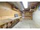 Unfinished basement workspace offers pegboard walls, workbench, and storage shelves at 10868 W 70Th Ave, Arvada, CO 80004