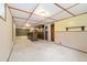 The basement offers partially finished space and bar area at 10868 W 70Th Ave, Arvada, CO 80004