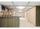 Basement with bar and partially finished space at 10868 W 70Th Ave, Arvada, CO 80004