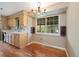 Cozy eat-in kitchen area with a bright window view and classic cabinetry at 10868 W 70Th Ave, Arvada, CO 80004