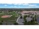 A large school and sports fields with trees in the surrounding neighborhood at 2334 Yosemite St, Denver, CO 80238
