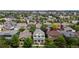 An aerial view showing the neighborhood of tree-lined streets at 2334 Yosemite St, Denver, CO 80238