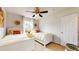 Cozy bedroom featuring twin beds, bright textiles, and a ceiling fan at 2334 Yosemite St, Denver, CO 80238