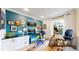 Office features a large desk, exercise bike, and ample storage at 2334 Yosemite St, Denver, CO 80238