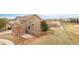 Picture of home's backyard showing fencing, landscaping, and proximity to open space at 21062 E Mansfield Pl, Aurora, CO 80013