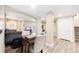 Open basement layout featuring living area, dining space, and neutral walls, perfect for entertaining and relaxation at 21062 E Mansfield Pl, Aurora, CO 80013