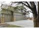 Charming two-story house with a three-car garage, a large driveway, and inviting curb appeal at 21062 E Mansfield Pl, Aurora, CO 80013