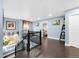 Spacious hallway with hardwood floors and elegant decor at 21062 E Mansfield Pl, Aurora, CO 80013