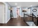 Hallway with hardwood floors and decorative accents at 21062 E Mansfield Pl, Aurora, CO 80013
