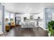 Bright and airy kitchen with a large center island, stainless steel appliances, and modern finishes at 21062 E Mansfield Pl, Aurora, CO 80013