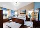 Bright bedroom with ample natural light and stylish decor at 21062 E Mansfield Pl, Aurora, CO 80013