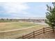 Neighborhood view featuring green space, walking path, a playground, and houses with mountain views at 21062 E Mansfield Pl, Aurora, CO 80013