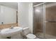 Bathroom featuring a sink and a glass-enclosed shower at 4638 S Mobile Way, Aurora, CO 80015