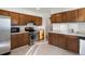 View of the kitchen showing the stainless steel appliances and wood cabinets at 4638 S Mobile Way, Aurora, CO 80015