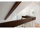 Wooden stairway showcasing white walls and natural light at 4638 S Mobile Way, Aurora, CO 80015