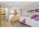 Bedroom featuring a comfortable bed, dresser and view from the window at 18771 Mexico E Dr, Aurora, CO 80017
