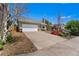 Single story home with an attached garage, and driveway at 18771 Mexico E Dr, Aurora, CO 80017