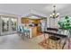Bright open floor plan with kitchen, breakfast bar, and dining area at 18771 Mexico E Dr, Aurora, CO 80017